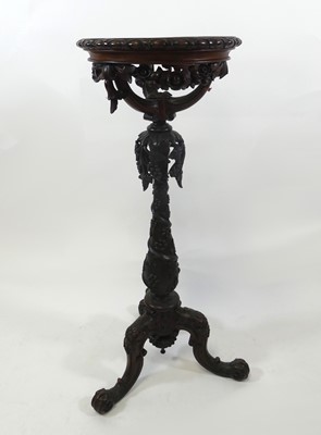 Lot 2291 - A mid-19th century carved fruitwood pedestal...