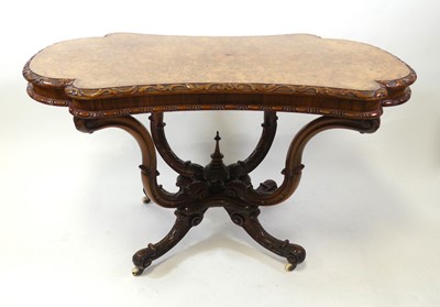 Lot 2318 - A mid-Victorian walnut and burr walnut topped...
