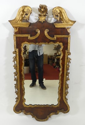 Lot 2308 - A mid-18th century walnut and parcel-gilt wall...
