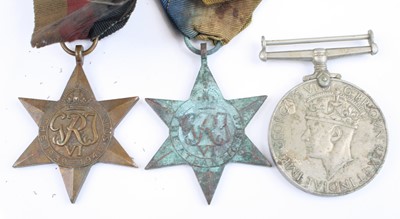 Lot 3276 - A collection of three WW II medals to include...