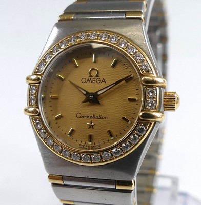 Lot 2141 - A lady's Omega Constellation bi-metal bracelet...