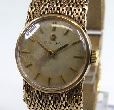 Lot 2140 - A lady's Omega 9ct gold cased bracelet watch,...