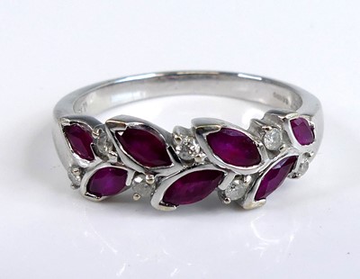 Lot 2105 - A modern 18ct white gold, ruby and diamond...