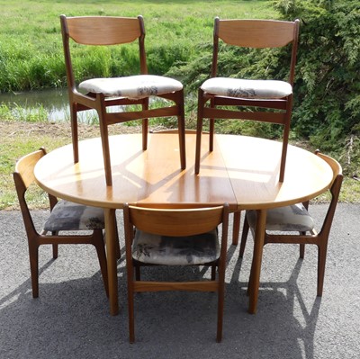 Lot 373 - A 1960s teak dining suite by A.H. McIntosh Ltd,...