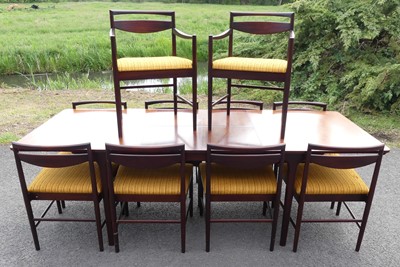 Lot 377 - A 1960s Indian rosewood dining suite by A.H....