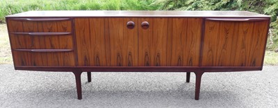 Lot 378 - A 1960s Indian rosewood long sideboard by A.H....