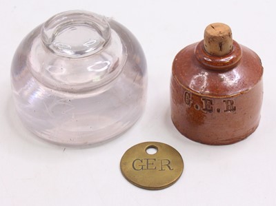 Lot 64 - Two Great Eastern Railway inkwells, to include...