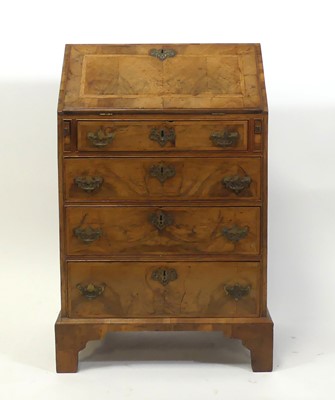 Lot 2306 - An antique walnut writing bureau, of small...