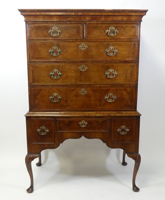 Lot 2325 - A George II walnut chest on later stand, the...