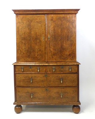 Lot 2339 - An early 18th century figured walnut and...