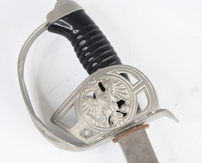 Lot 3465 - A Prussian sword, having a 82cm etched blade,...