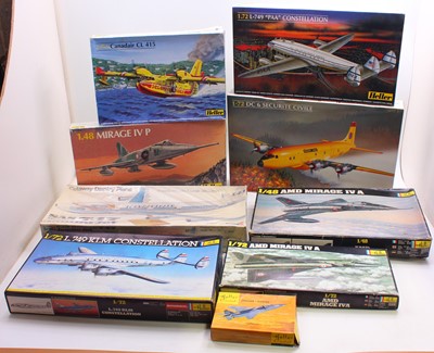 Lot 764 - One box containing 9 Heller plastic aircraft...