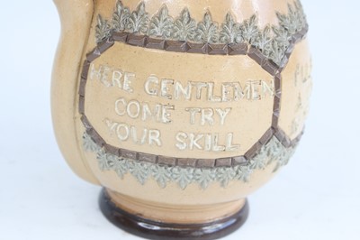 Lot 2065 - A Doulton Lambeth stoneware puzzle jug, the...