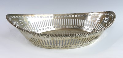 Lot 2163 - A George V silver table basket, of pierced...