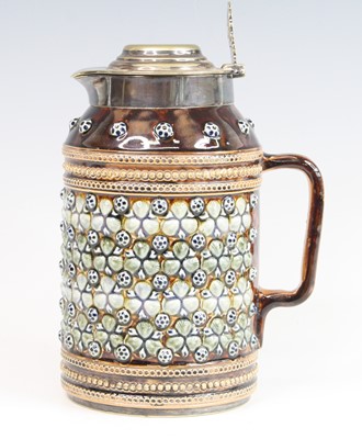 Lot 2061 - A Doulton Lambeth stoneware jug, having a...