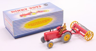 Lot 1059 - Dinky Toys No. 27AK farm tractor and hay rake...