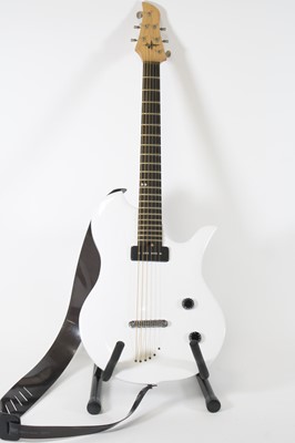 Lot 1318 - A solid body six string electric guitar, in...