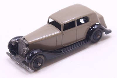 Lot 1092 - Dinky Toys No.30C Daimler in fawn/grey body...