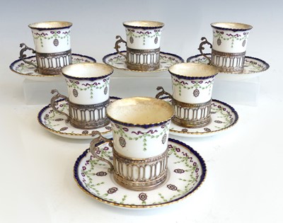 Lot 2079 - An Edwardian cased set of six coffee cans and...