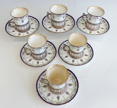 Lot 2079 - An Edwardian cased set of six coffee cans and...