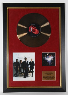 Lot 1295 - The Rolling Stones, a CD gold disc for the...