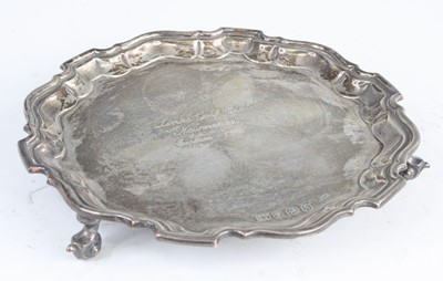 Lot 1580 - A mid-20th century silver card waiter, of...