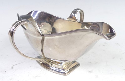 Lot 97 - An Art Deco silver twin handled footed...