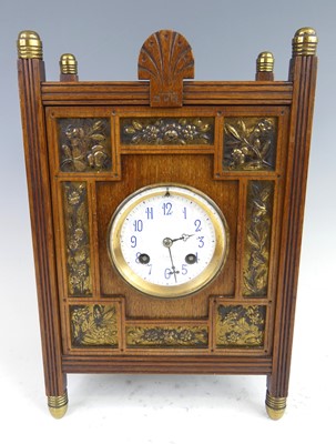 Lot 152 - An Aesthetic Movement mahogany mantel clock by...