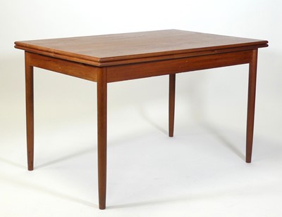 Lot 439 - A 1960s Danish teak drawleaf dining table, of...