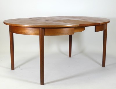 Lot 1170 - A 1960s teak extending dining table by...