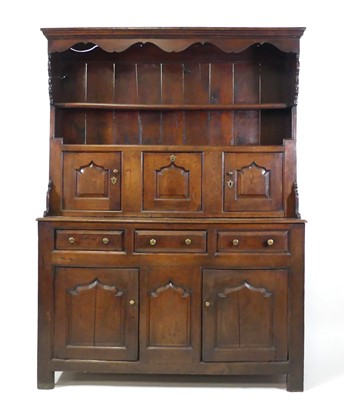 Lot 2526 - An early 18th century joined oak dresser, the...