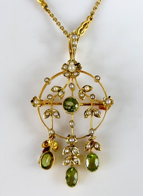 Lot 2232 - A yellow metal Edwardian openwork peridot and...