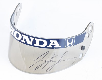 Lot 1592 - A McLaren motor racing helmet visor, signed in...