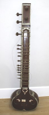 Lot 1373 - A 20th century Indian sitar, having bone...