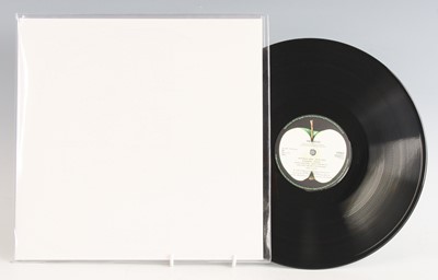 Lot 1017 - The Beatles - a collection of three re-issue...