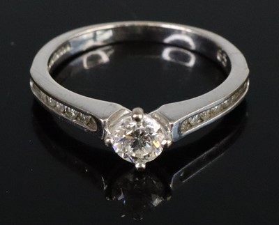 Lot 279 - An 18ct white gold diamond solitaire ring,...
