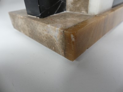 Lot 9 - A French Art Deco variegated marble clock...