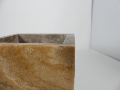 Lot 9 - A French Art Deco variegated marble clock...
