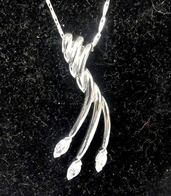 Lot 2739 - A new 18ct white gold diamond pendant on trace...
