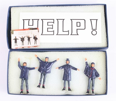 Lot 1336 - The Beatles - a set of four painted lead...