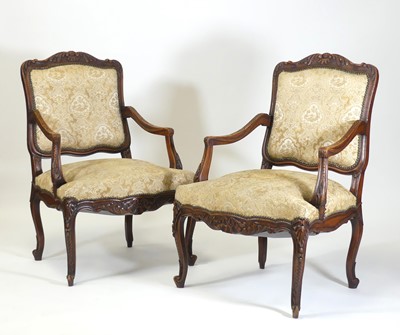 Lot 2542 - A pair of French carved and stained beechwood...