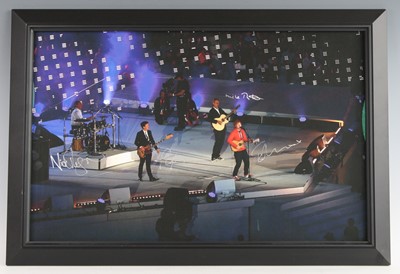 Lot 1301 - A signed photograph of Nick Mason, Richard...