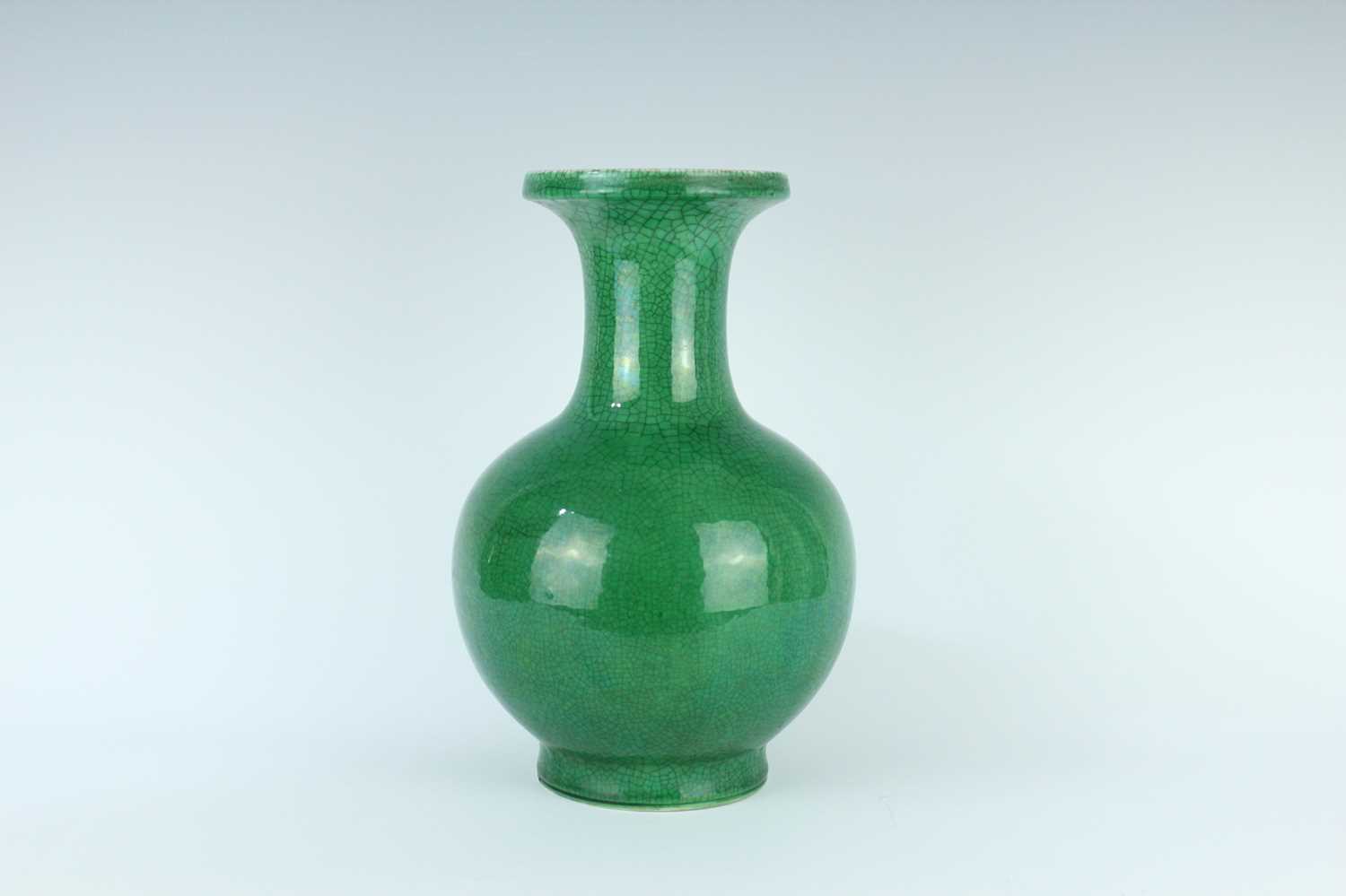 Lot 78 - A Chinese apple-green crackle-glazed vase,...