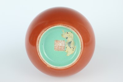 Lot 84 - A pair of Chinese coral-red bottle vases with...