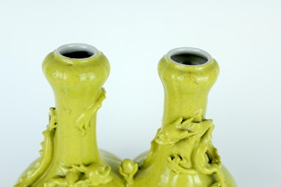 Lot 81 - A rare Chinese lemon-yellow glazed conjoined...