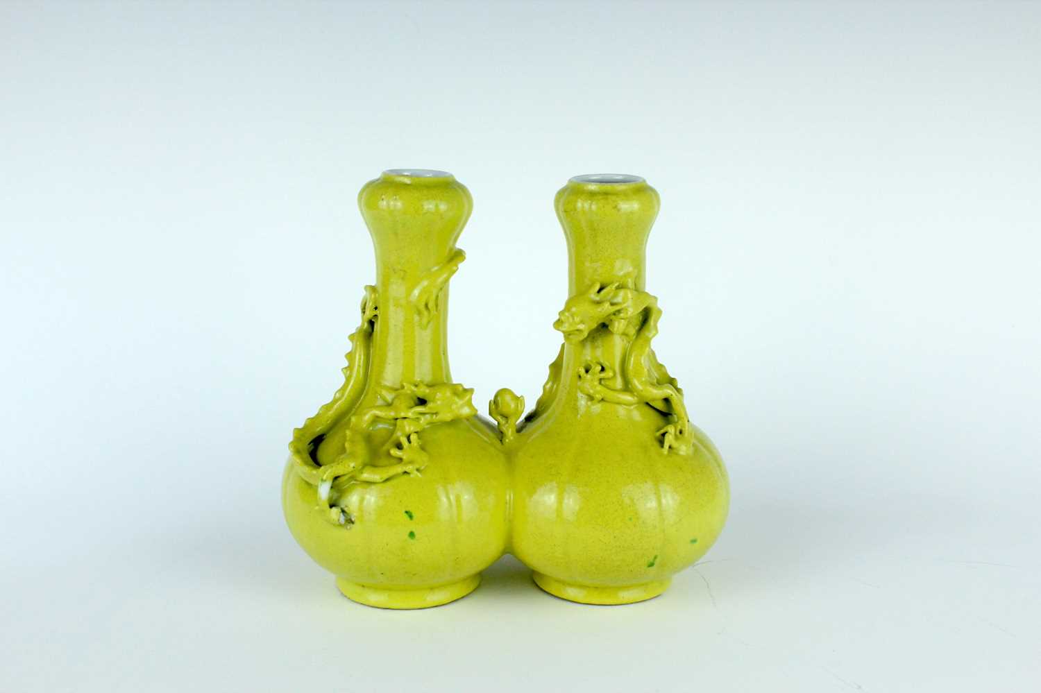Lot 81 - A rare Chinese lemon-yellow glazed conjoined...