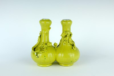 Lot 81 - A rare Chinese lemon-yellow glazed conjoined...