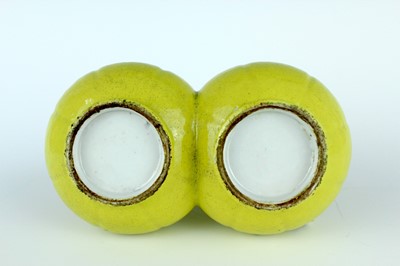Lot 81 - A rare Chinese lemon-yellow glazed conjoined...