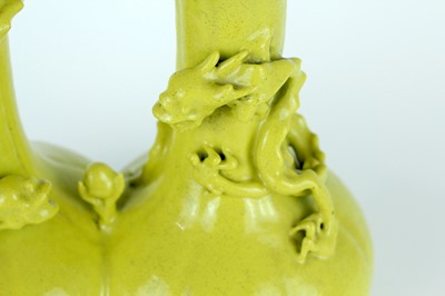 Lot 81 - A rare Chinese lemon-yellow glazed conjoined...