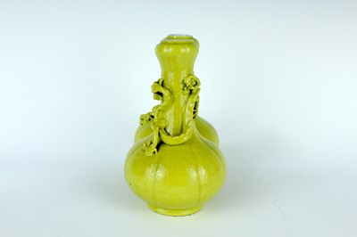 Lot 81 - A rare Chinese lemon-yellow glazed conjoined...